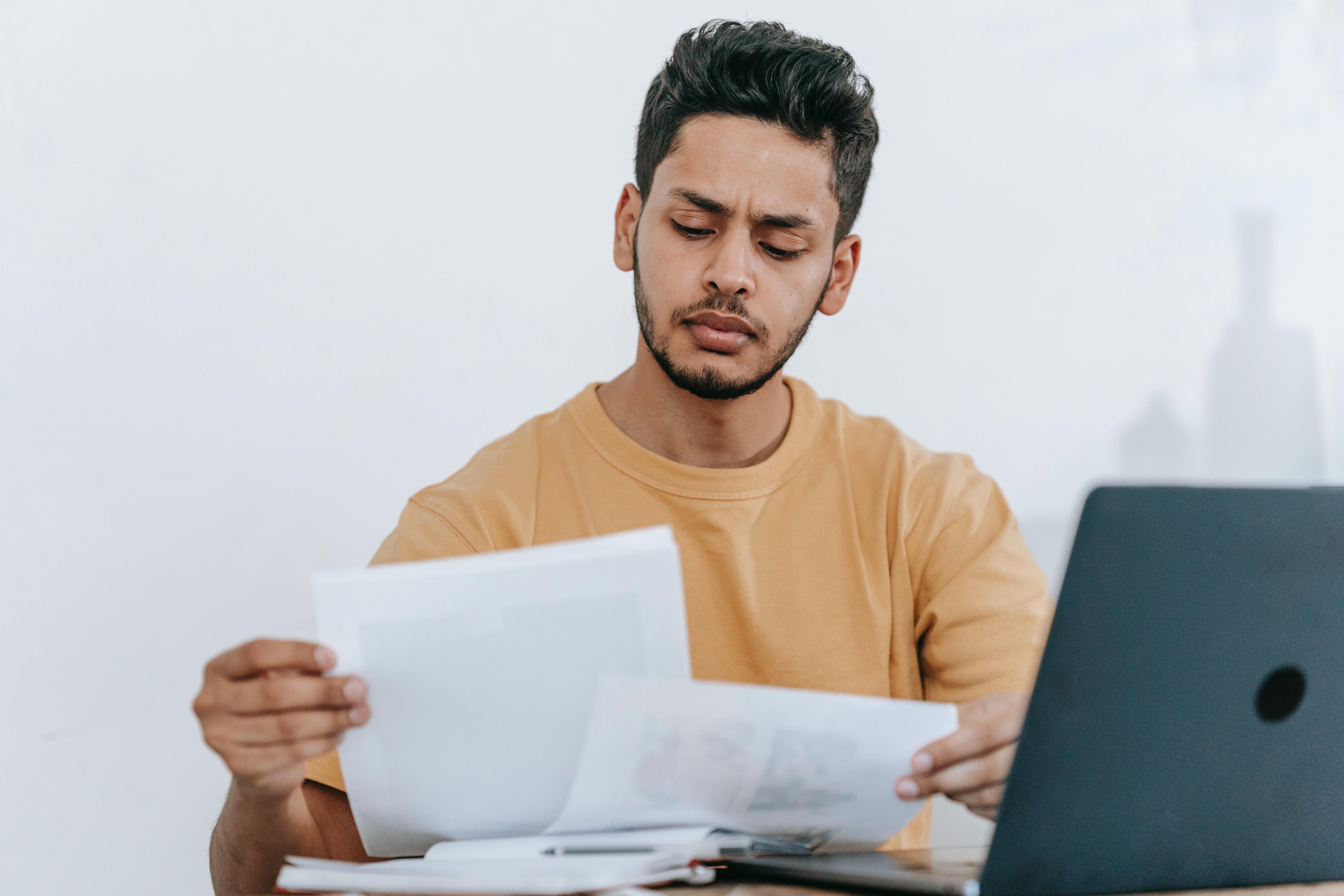 man checking documents