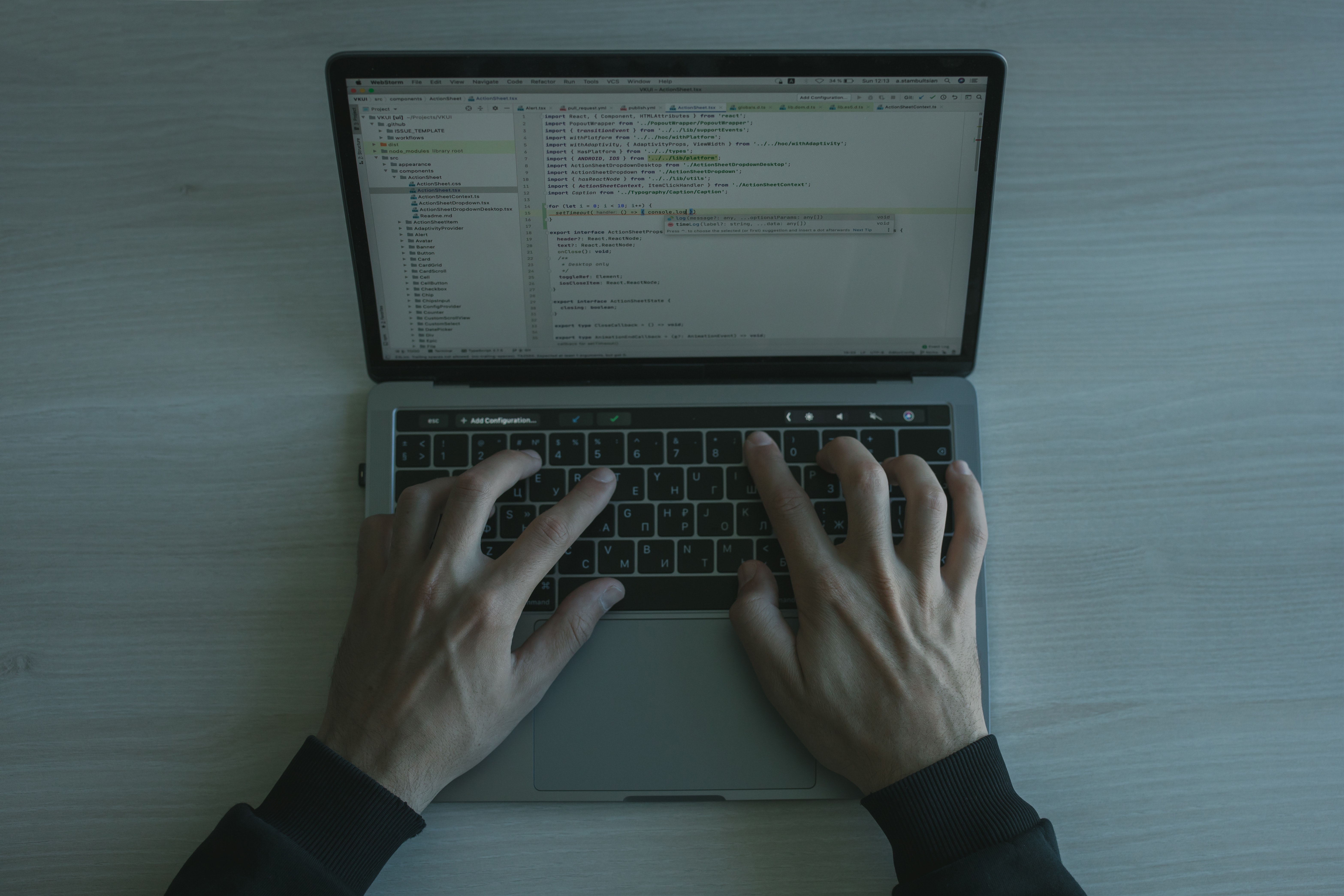 man running code on computer